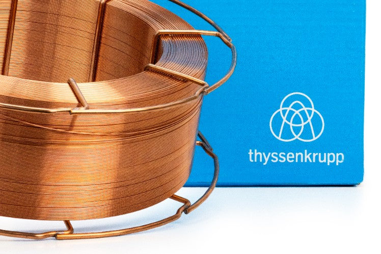 Karton transportowy z logo thyssenkrupp zawierający drut spawalniczy SG2